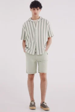 Bermuda color ligera lavada slim fit