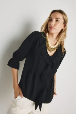 Blusa con volantes