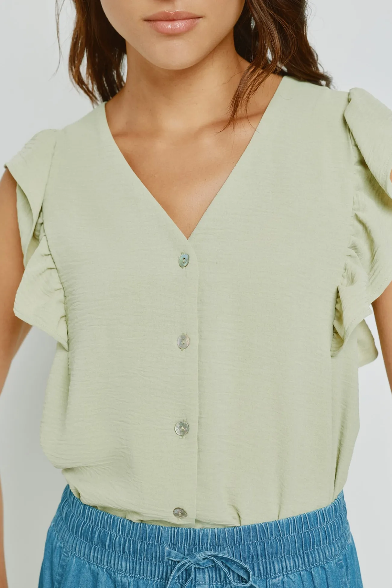 Blusa con volantes