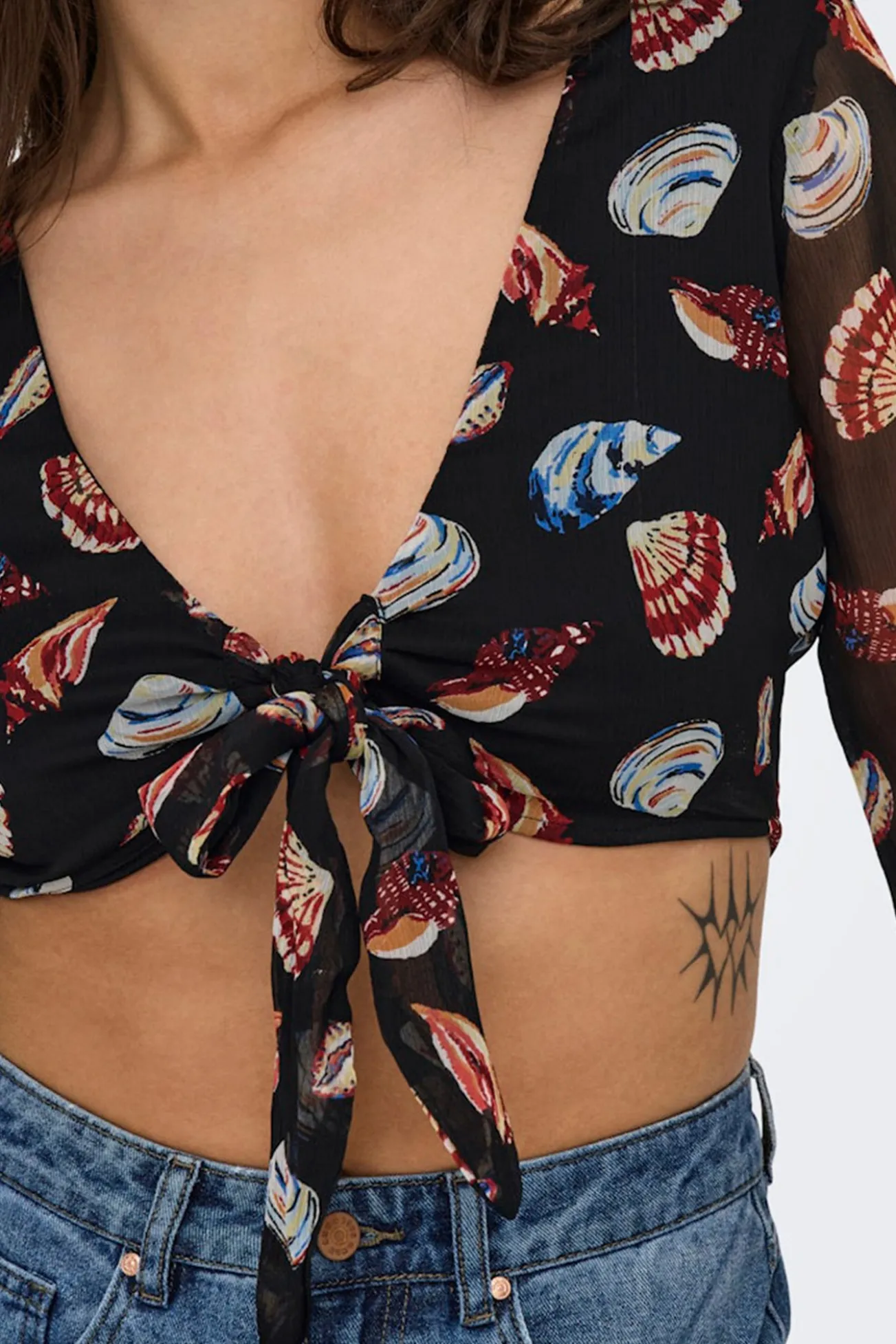 Blusa corta ajustable