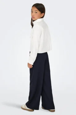 Blusa corta de manga larga con detalle de brillo