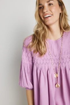 Blusa cuello redondo