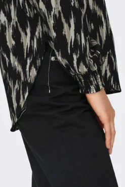 Blusa fluida de manga larga