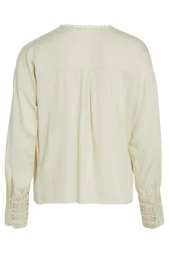 Blusa manga larga bordados