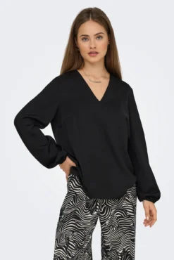 Blusa manga larga puño elástico