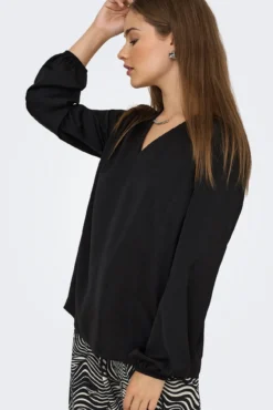 Blusa manga larga puño elástico