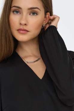 Blusa manga larga puño elástico