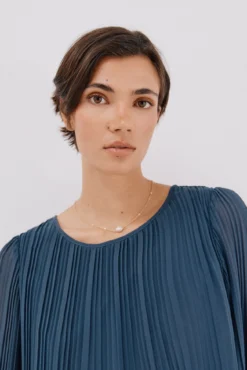 Blusa plisada