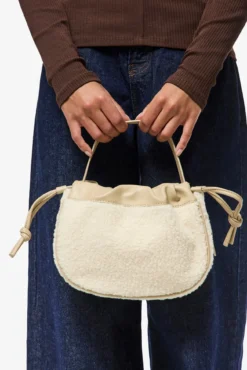 Bolso bombonera teddy detalles piel