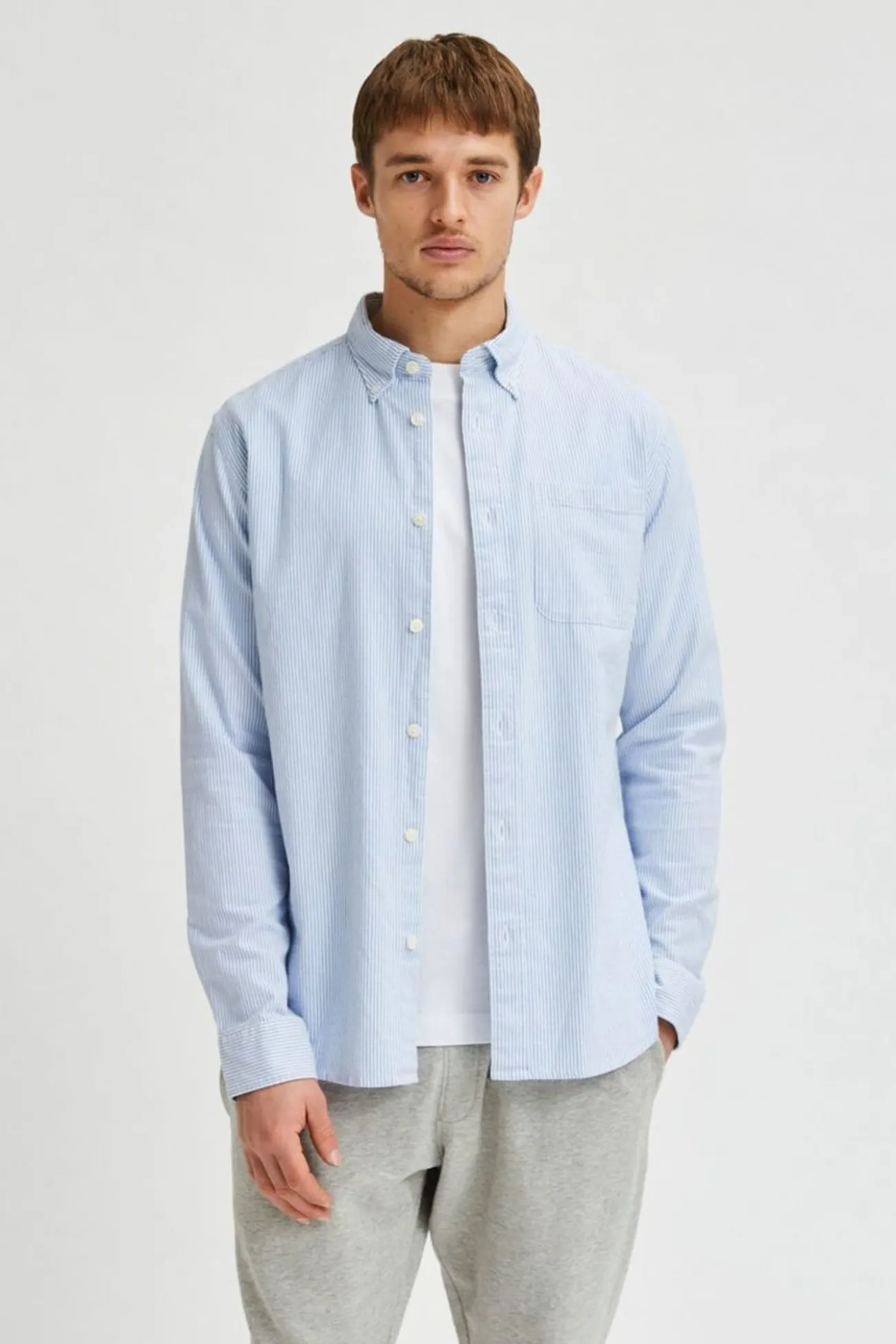 Camisa de manga larga con bolsillo 100% algodón