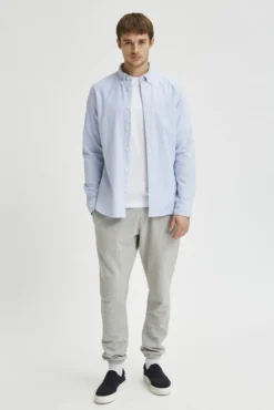 Camisa de manga larga con bolsillo 100% algodón