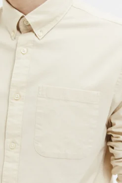 Camisa de manga larga con bolsillo 100% algodón