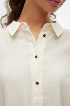 Camisa de manga larga con espalda plisada
