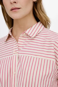 Camisa manga larga tachas