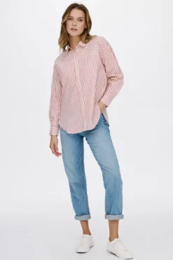 Camisa manga larga tachas