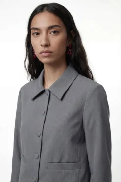 Chaqueta estilo blazer con botones forrados