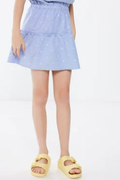 Falda flores blancas niña
