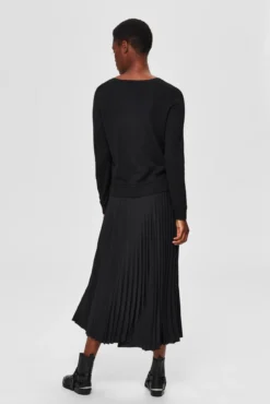 Falda midi plisada con cintura elástica