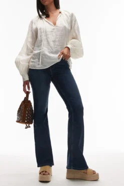 Jeans flare de tiro alto