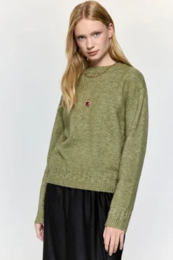 Jersey cuello caja detalles trenzas