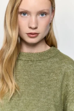 Jersey cuello caja detalles trenzas
