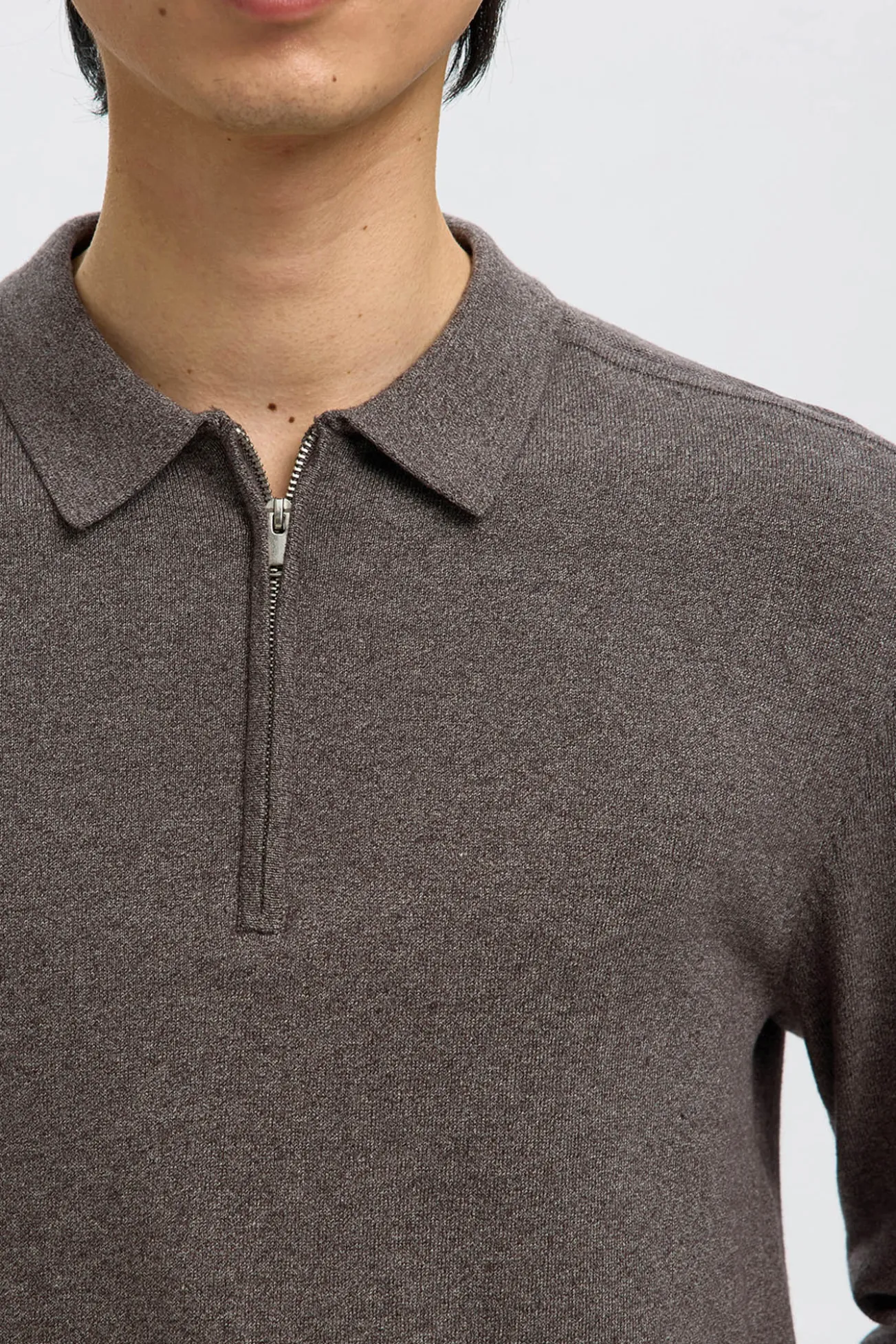 Jersey polo media cremallera 100% algodón.