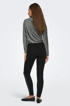 Legging tachuelas laterales
