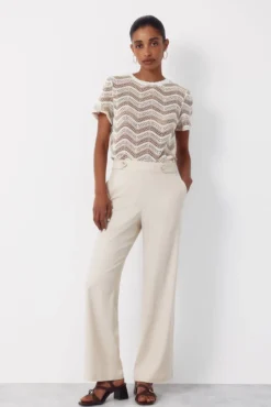Pantalón con lino con botones dorados