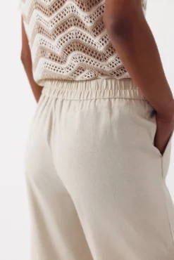 Pantalón con lino con botones dorados