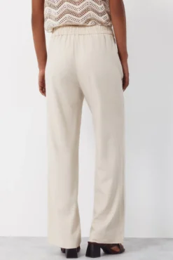 Pantalón con lino con botones dorados