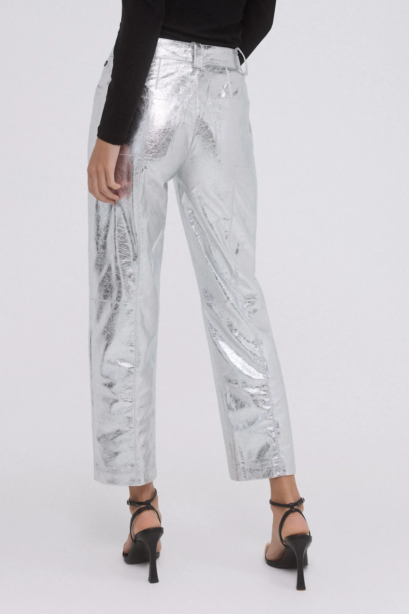 Pantalón PU metalizado cortes
