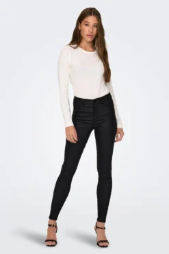 Pantalón skinny encerado tiro alto