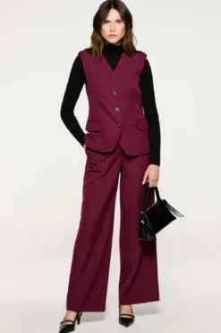 Pantalón traje pinzas.