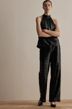 Pantalones rectos de fiesta con lentejuelas confeccionado con materiales reciclados