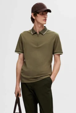 Polo de manga corta con cremallera de algodón orgánico.
