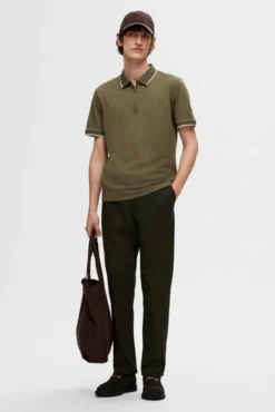 Polo de manga corta con cremallera de algodón orgánico.