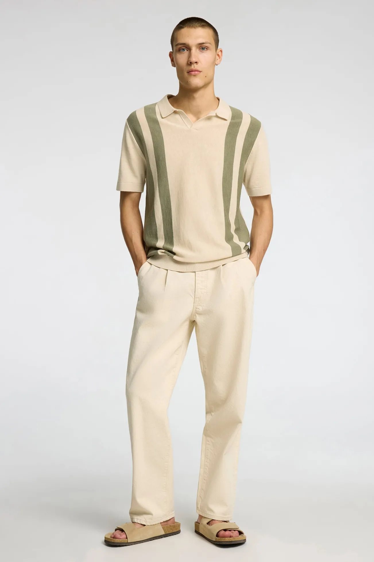 Polo de punto con cuello abierto