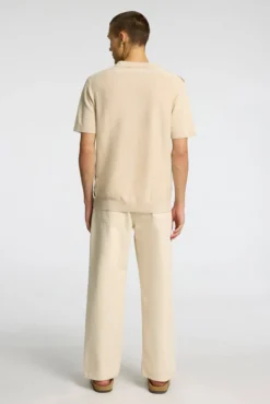 Polo de punto con cuello abierto