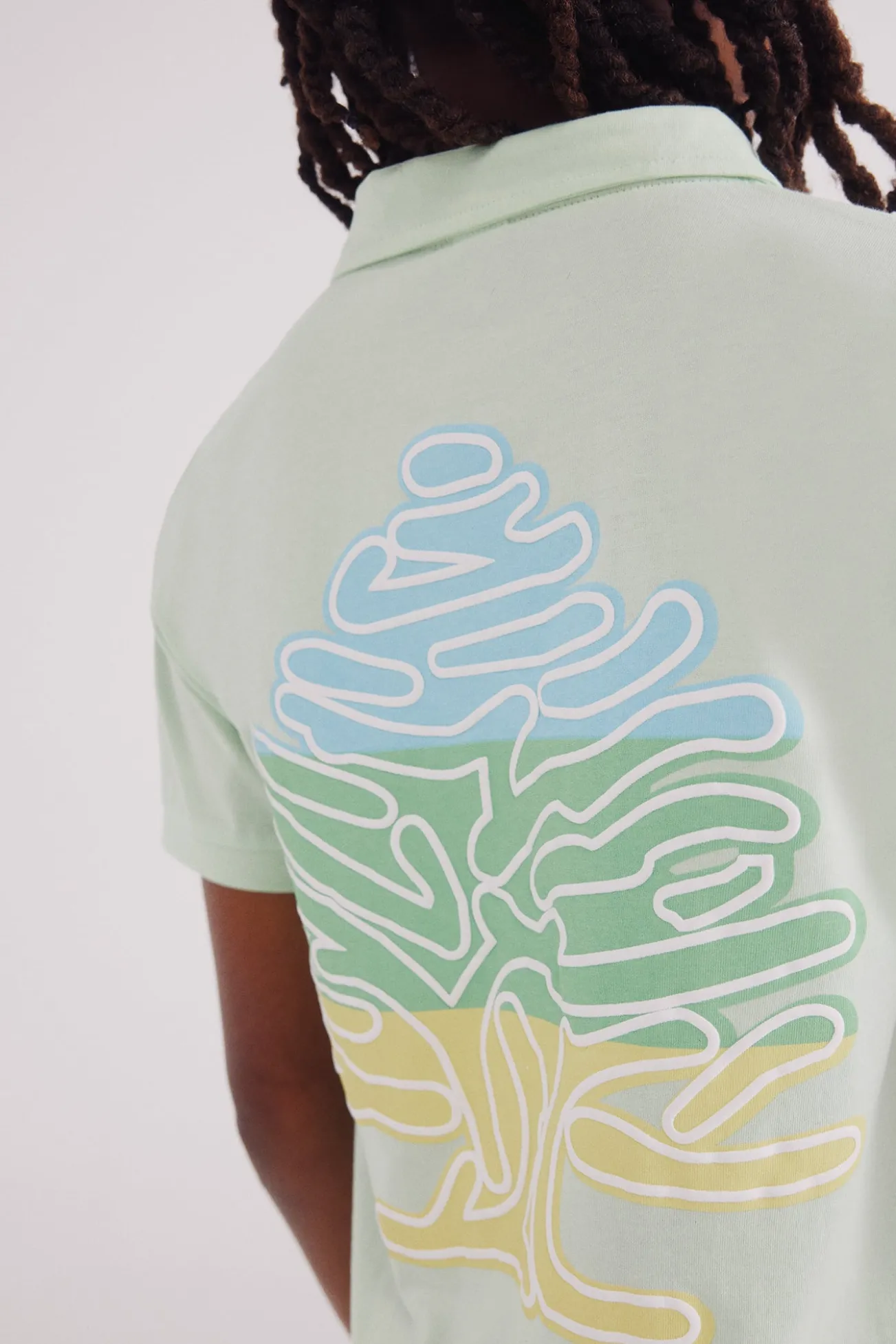 Polo logo espalda niño