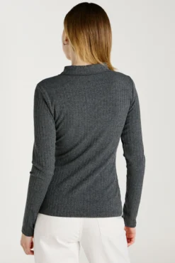 Top de manga larga con cuello polo