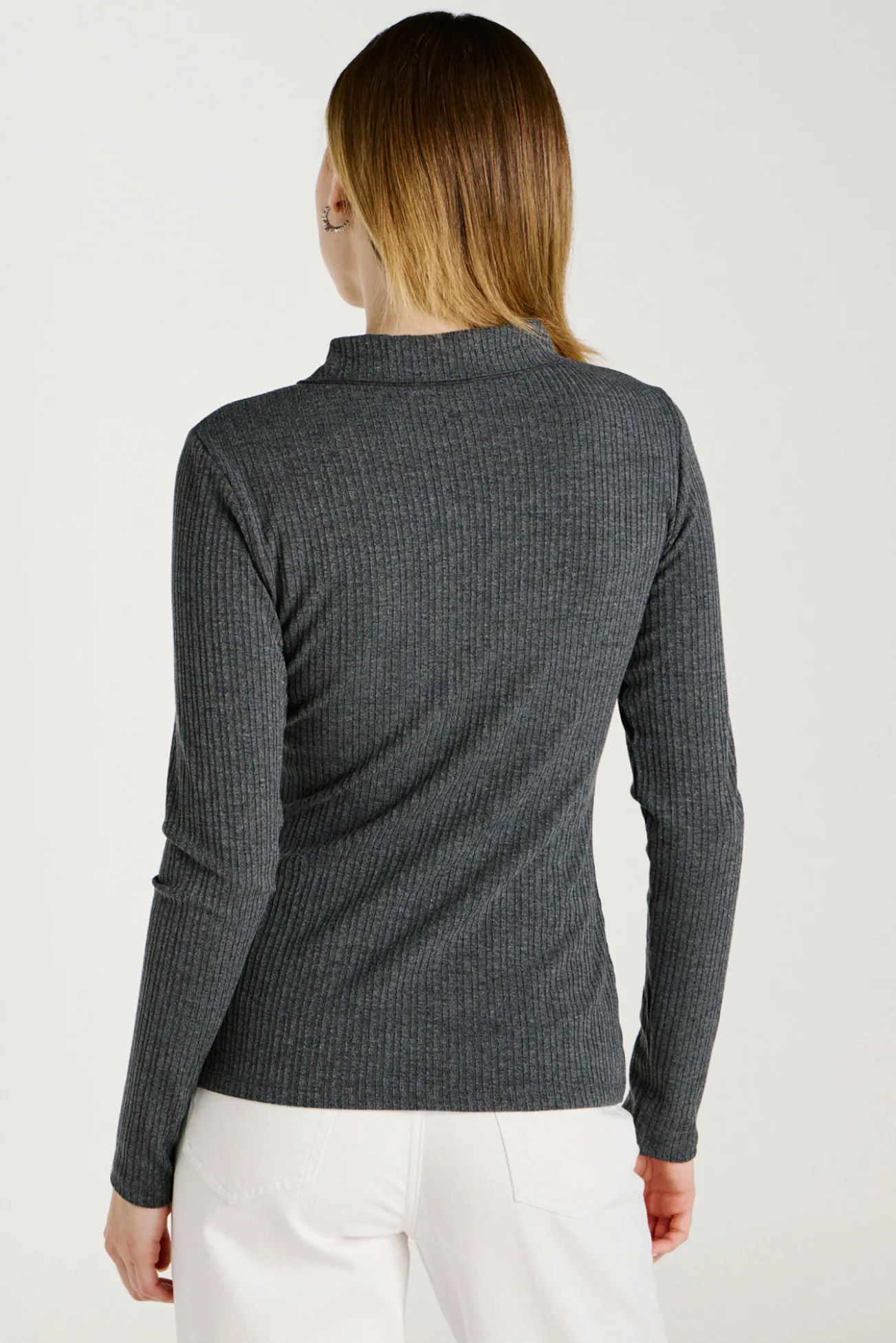 Top de manga larga con cuello polo