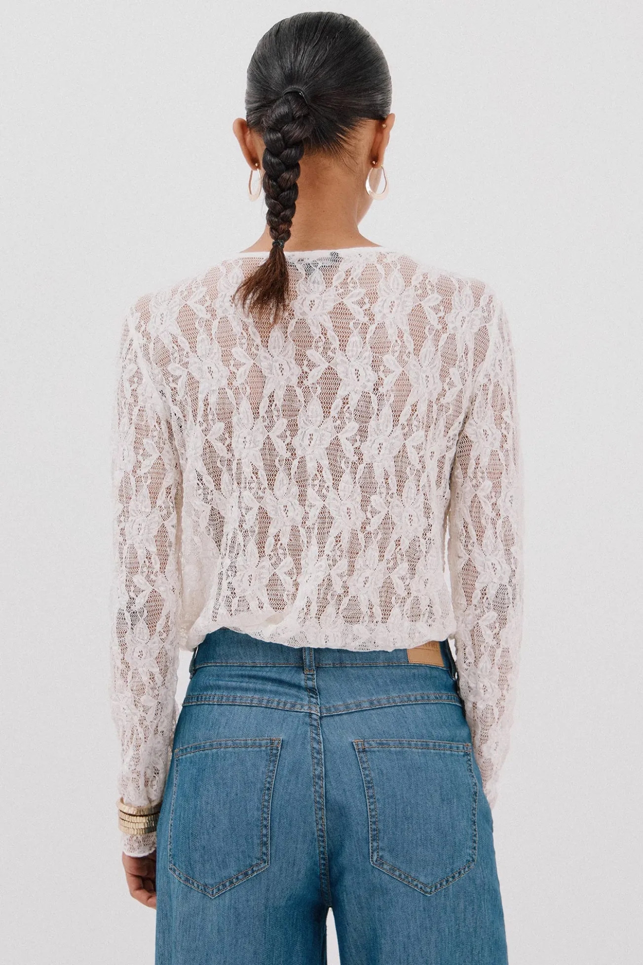 Top encaje volante