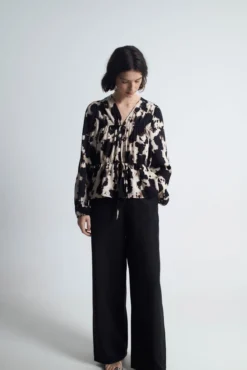 Top estampado lazos