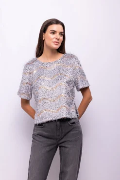 Top lentejuelas y flecos
