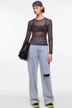 Top tul de manga larga y print en leopardo