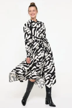 Vestido midi camisero y bajo asimétrico