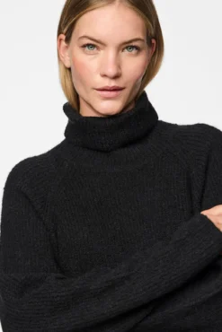Vestido punto cuello vuelto